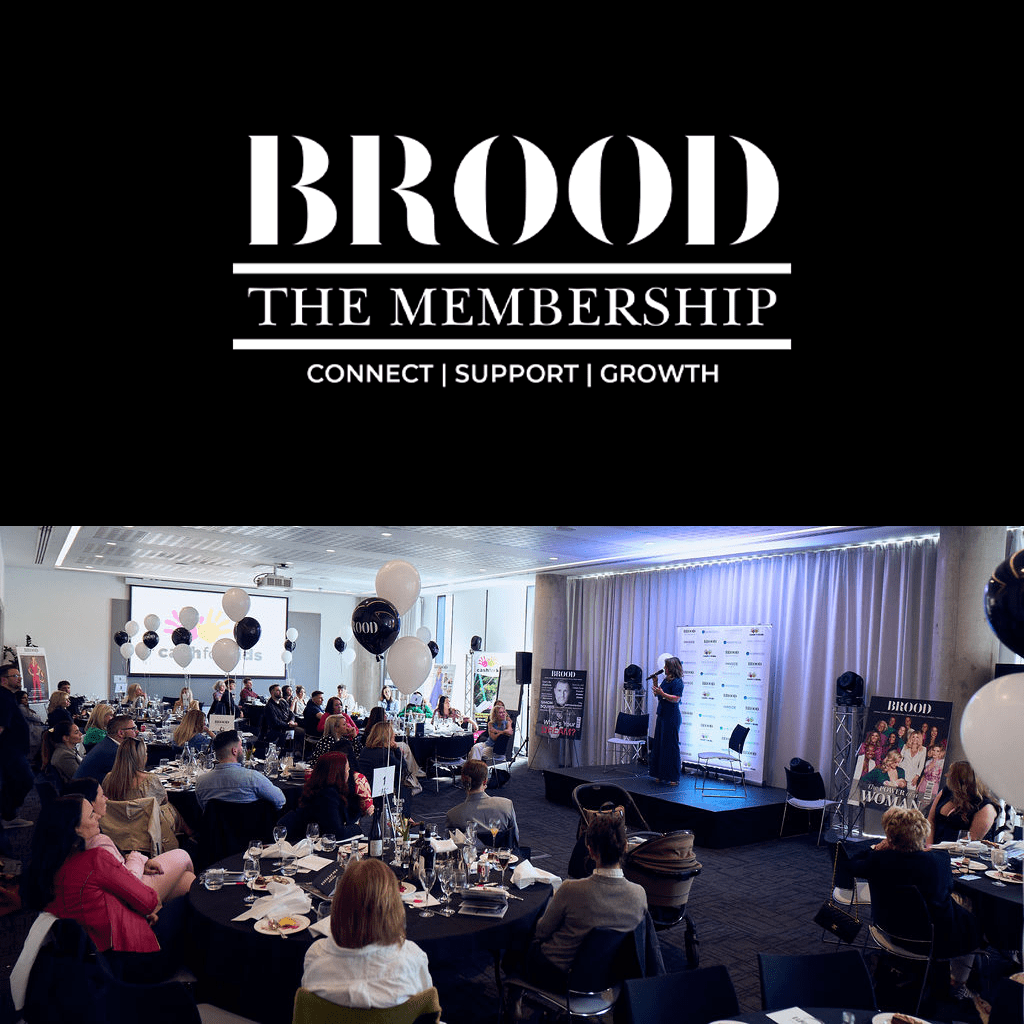 BROOD Membership event – group of entrepreneurial parents networking and listening to a speaker at a professional event, with BROOD branding and balloons, promoting connection, support, and growth.